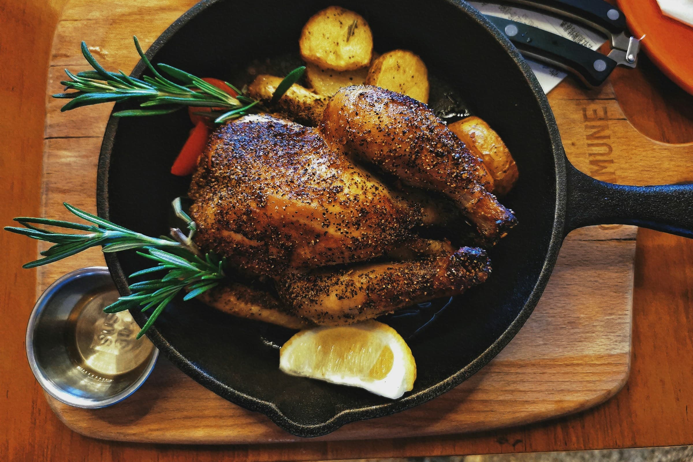 Wood-roasted half chicken with roasted grapes